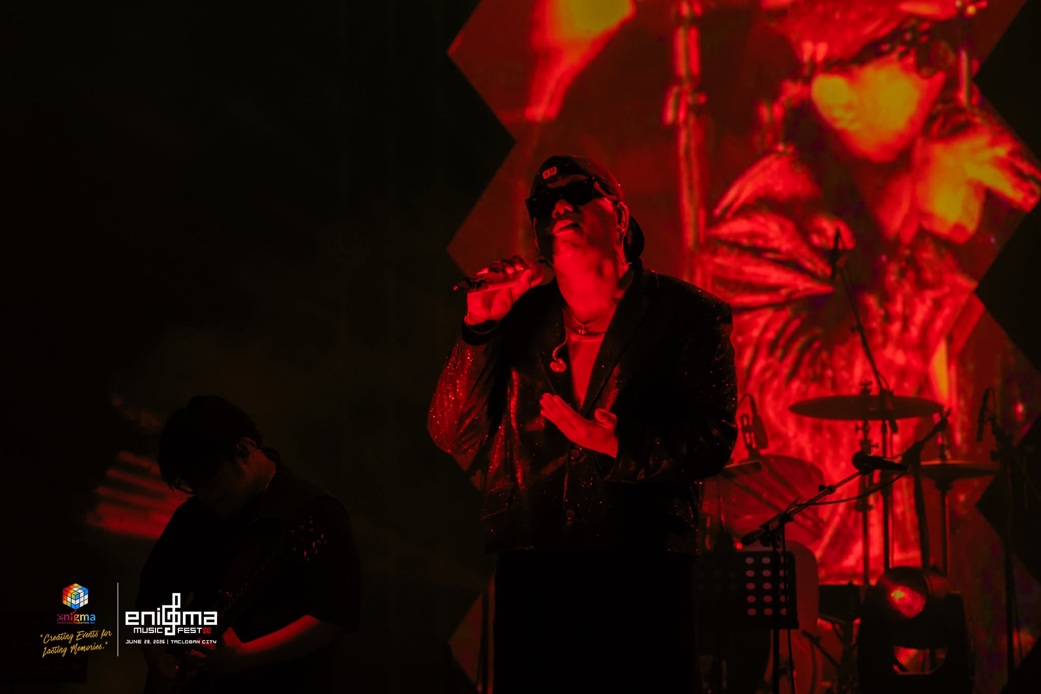 Dionela performing under red stage lights at Enigma Music Fest 2026