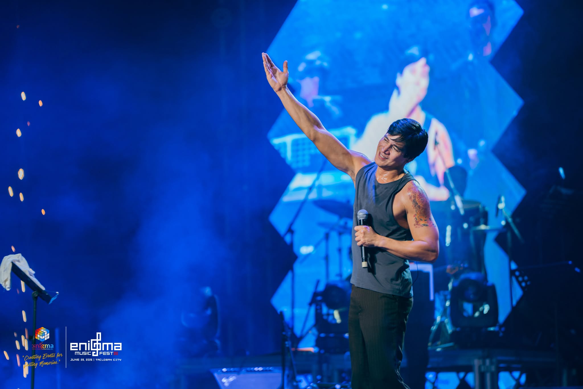 Piolo Pascual performing under blue stage lights at Enigma Music Fest 2026